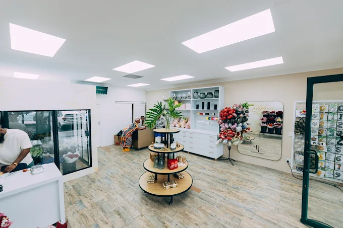 Handsome Florist florists handcrafting an arrangement